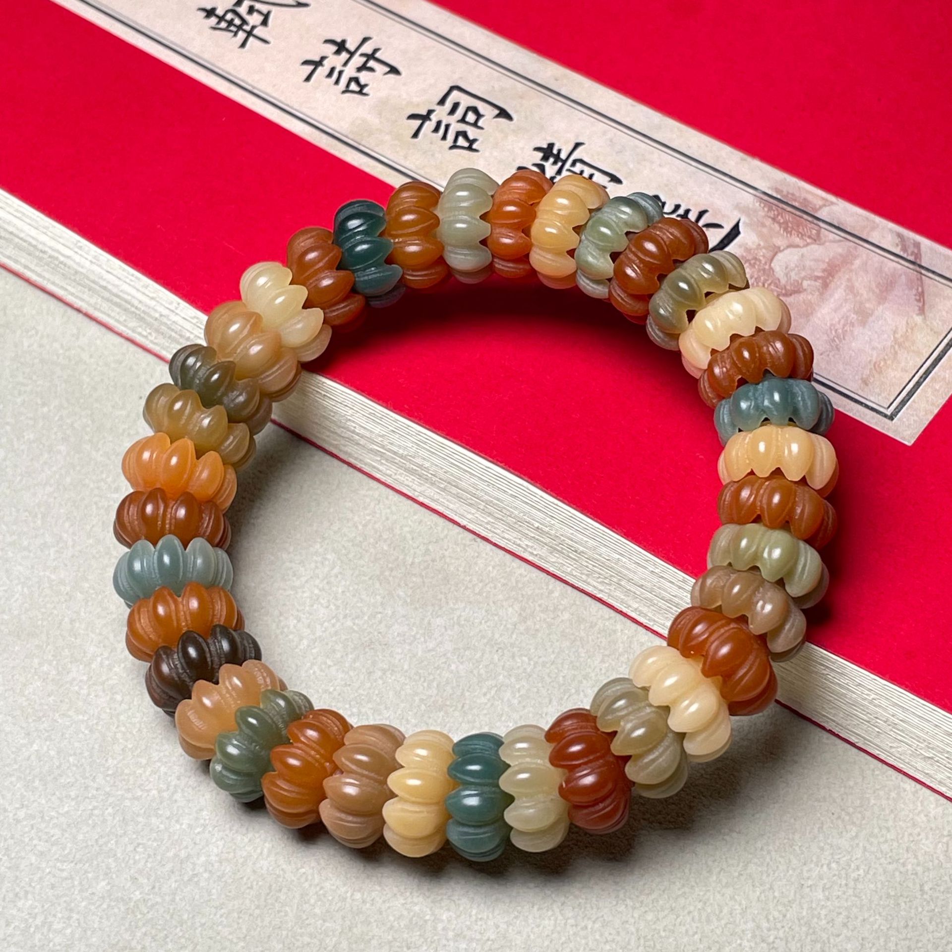 爆款白玉菩提根多宝九瓣莲花蜜罐雕刻手链学生绕指柔饰品