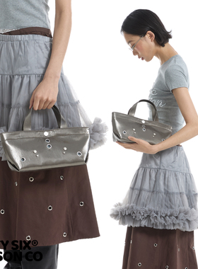 DirtySix 2025SS 原创 Haji 皮尔斯手袋 穿孔小腊肠 铆钉手提包