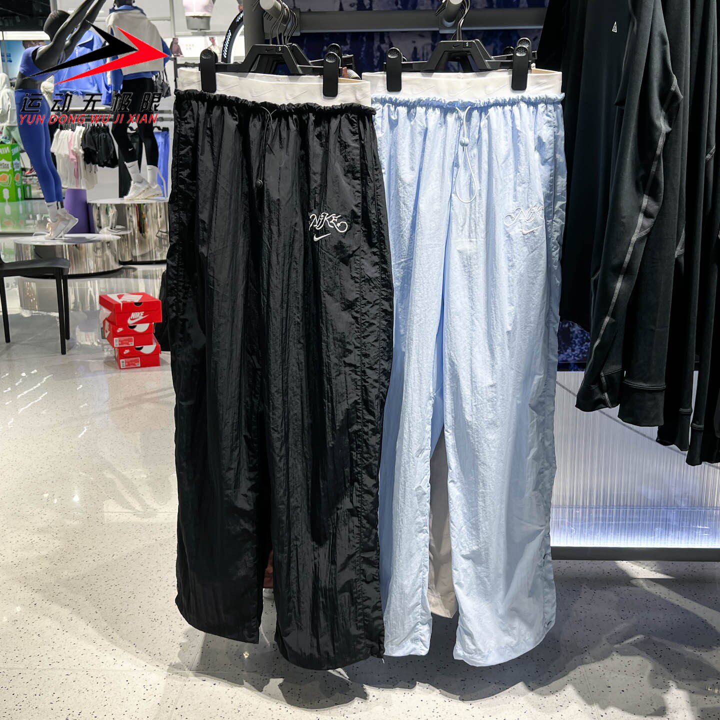 Nike耐克女装2026夏新款运动休闲宽松直筒梭织长裤IR7573-010-411