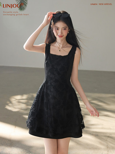 Black sleeveless mini dress worn by a model