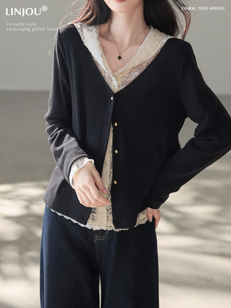 Model wearing a black button-front cardigan over a lace-trim top