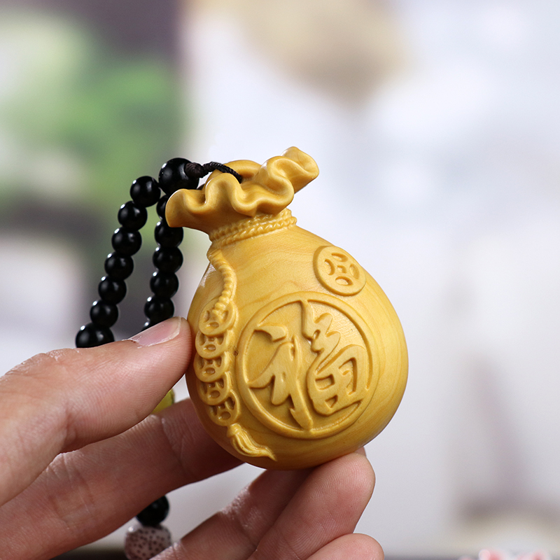 黄杨木雕招财福袋手把件挂件饰品