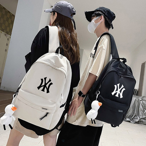 奥莱联名双肩包男女大容量电脑背包休闲情侣初中生高中大学生书包