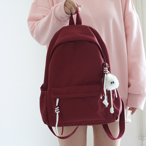 休闲女双肩背包简约百搭纯色书包