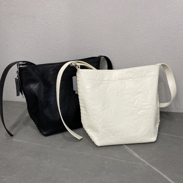 2026韩版新款时尚水桶包包女植鞣软皮单肩包大容量休闲简约斜挎包,箱包皮具/热销女包/男包,水桶包,淘宝优惠券,粉丝福利购,淘宝优惠卷