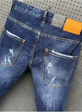 Ripped paint-splattered mens slim-fitting patch stretch