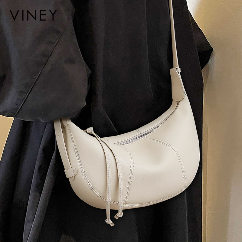 Viney包包2026新款女包夏季真皮牛角包单肩斜挎包轻奢小众饺子包