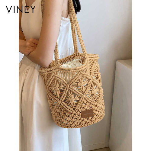 Viney编织包包2026新款夏季草编包通勤手工沙滩包女包单肩水桶包