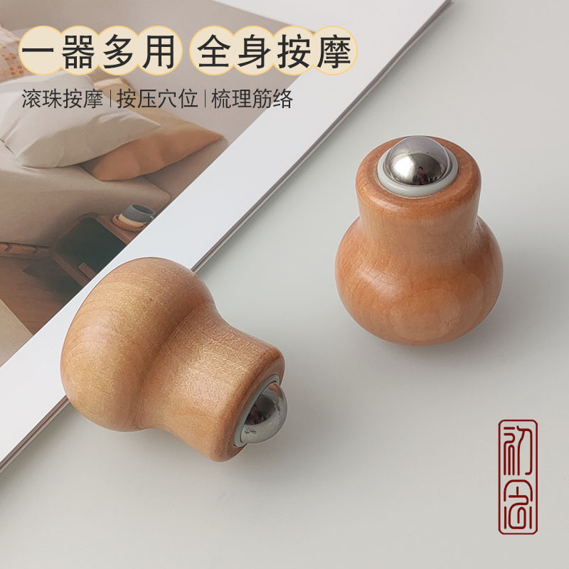 创意新款灯泡滚珠脸部按摩器迷你手持式家用身体经络梳通按摩