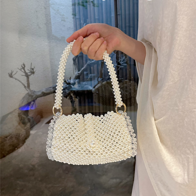 小众设计新款编织包时尚珍珠链条海边度假高级感女法式通勤托特包