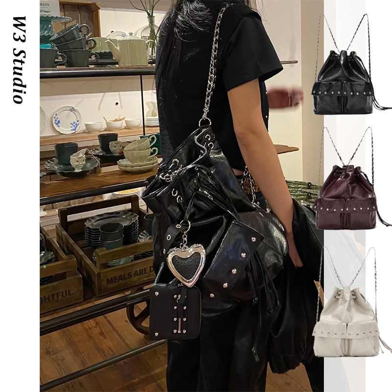 韩国小众deinet抽绳油蜡皮双肩包辣妹铆钉链条机车包单肩斜跨包