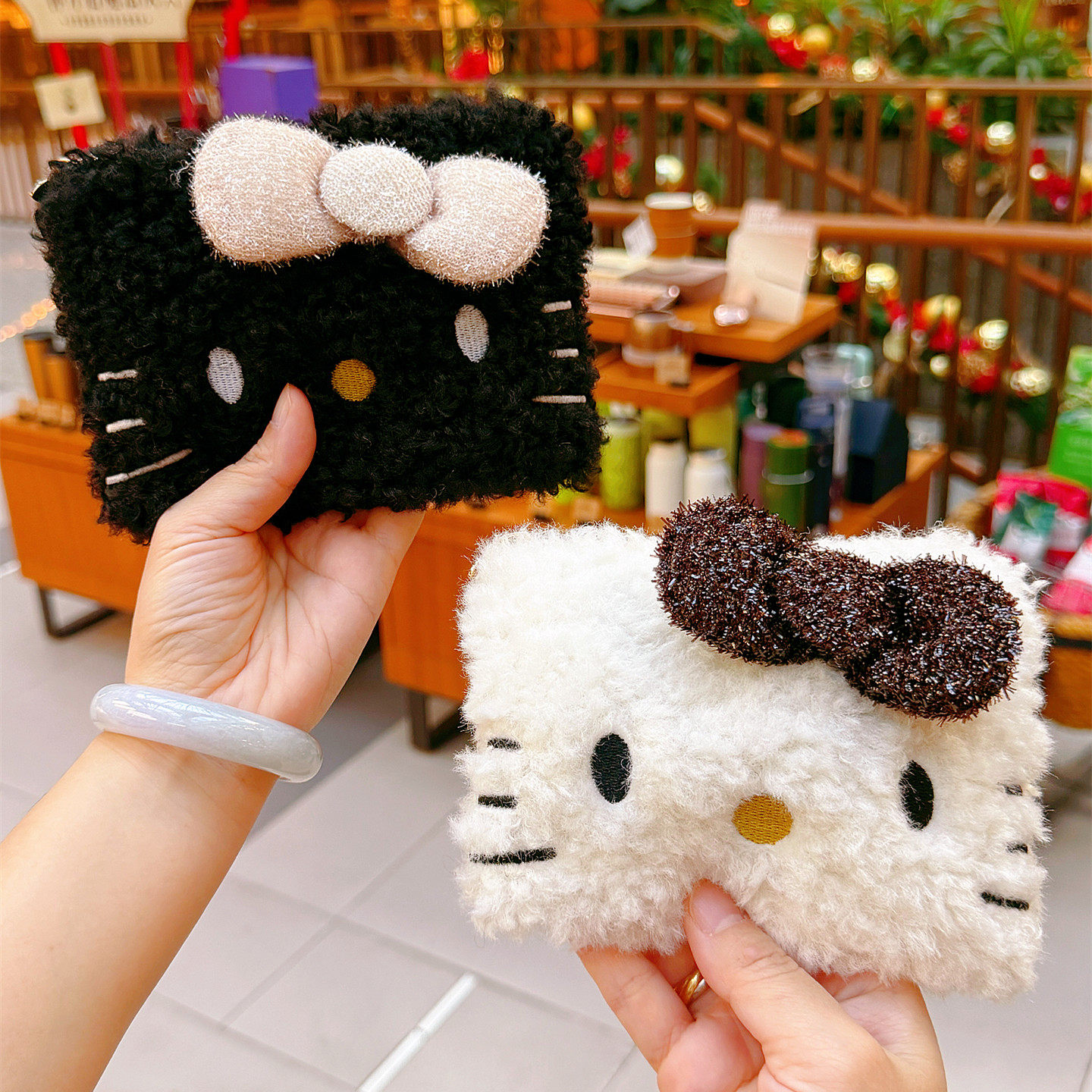 日系helloKitty毛绒零钱包凯蒂猫可爱蝴蝶结小物收纳包口红化妆包