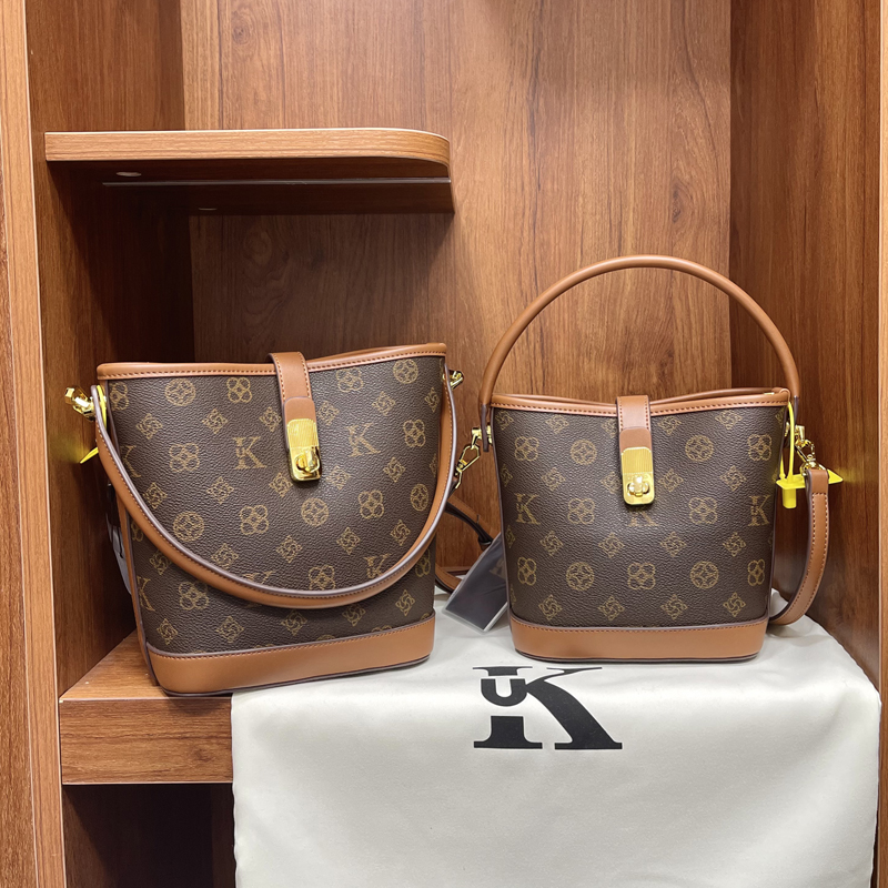 优库迪斯时尚水桶包休闲老花斜挎