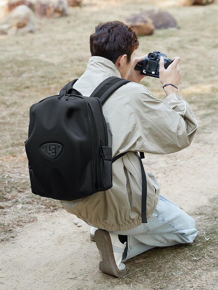 电脑背包男单反相机包适用于富士佳能大学生书包 摄影包 女士硬壳