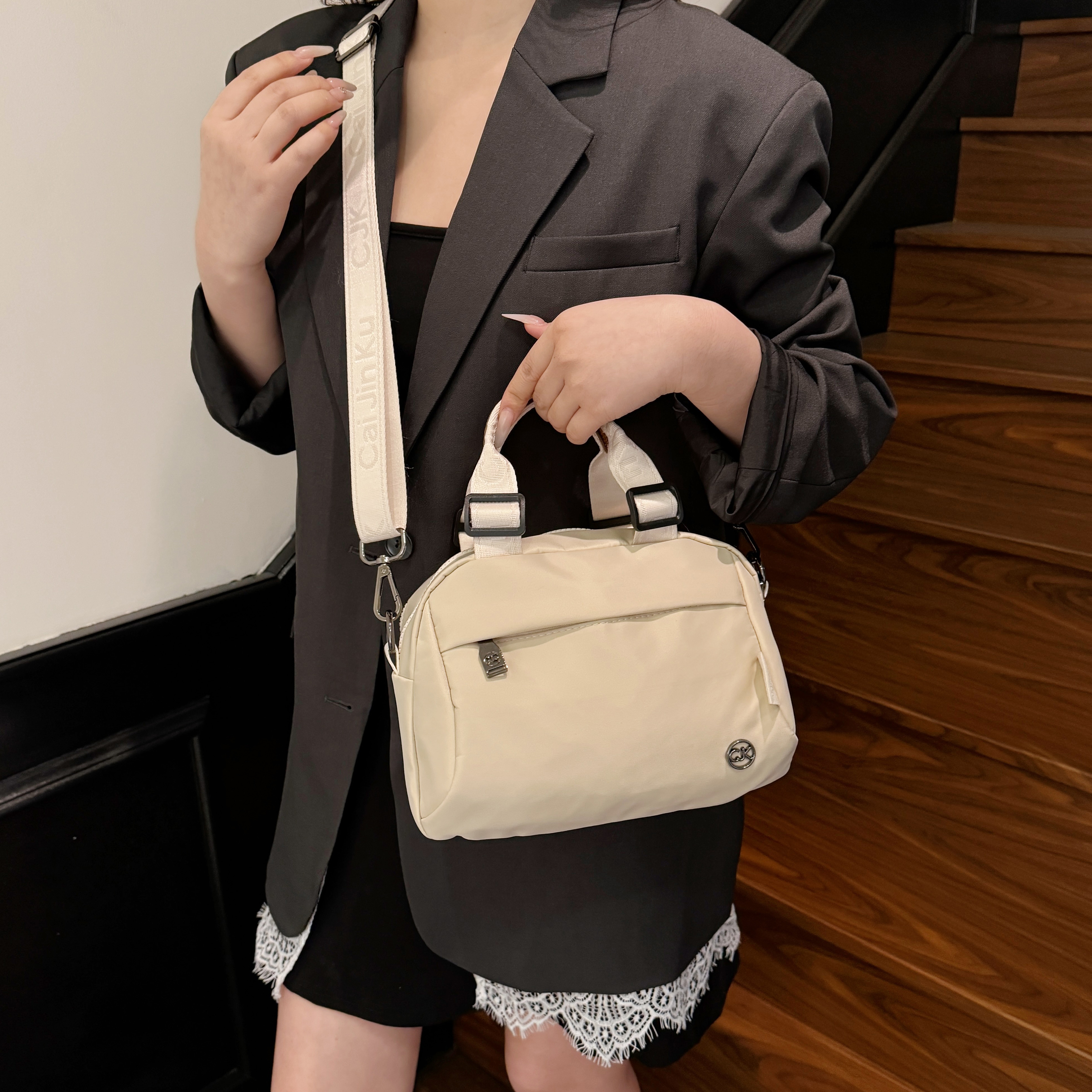 红鹮鸟女士简约轻便牛津布女包2025新款高级感帆布休闲斜挎包双层
