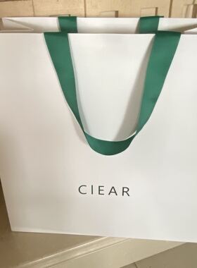 免排版手提袋高端定制纸袋服装店包装袋烫字logo绿色丝带白购物袋