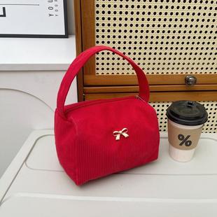 2025新款日常休闲潮流时尚复古灯芯绒纯色手拎手腕包法棍化妆包女