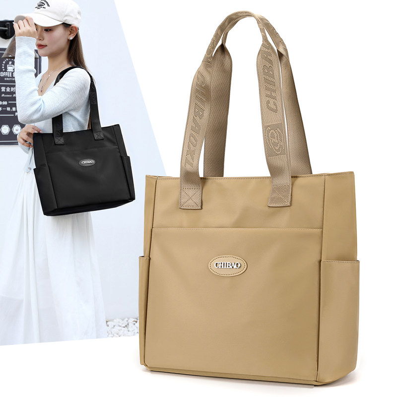 大容量包包女2025新款时尚单肩包百搭托特包牛津布手提通勤妈咪包