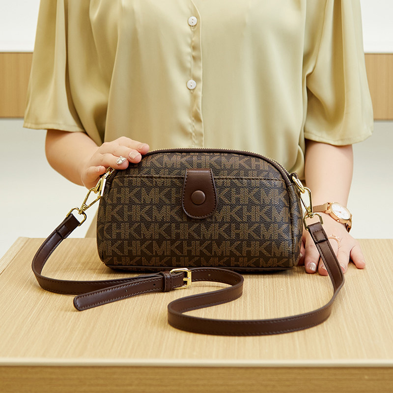 意尔康真皮手机包包女2023新款潮女士时尚手拿包百搭单肩斜挎小包