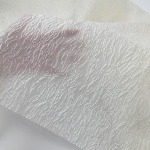 微廓米白提花欧根纱布料连衣裙布