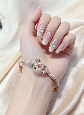 明星同款爆款扭结蝴蝶结女新款高级感轻奢半钻玫瑰金奢华手镯