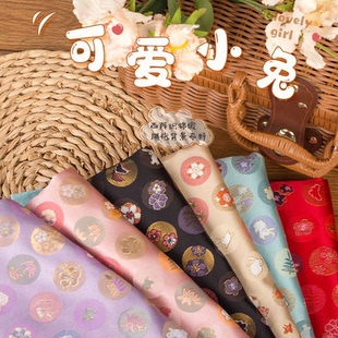 西阵织织金织锦缎可爱小兔提花儿童年衣服口金包汉服马面旗袍布料