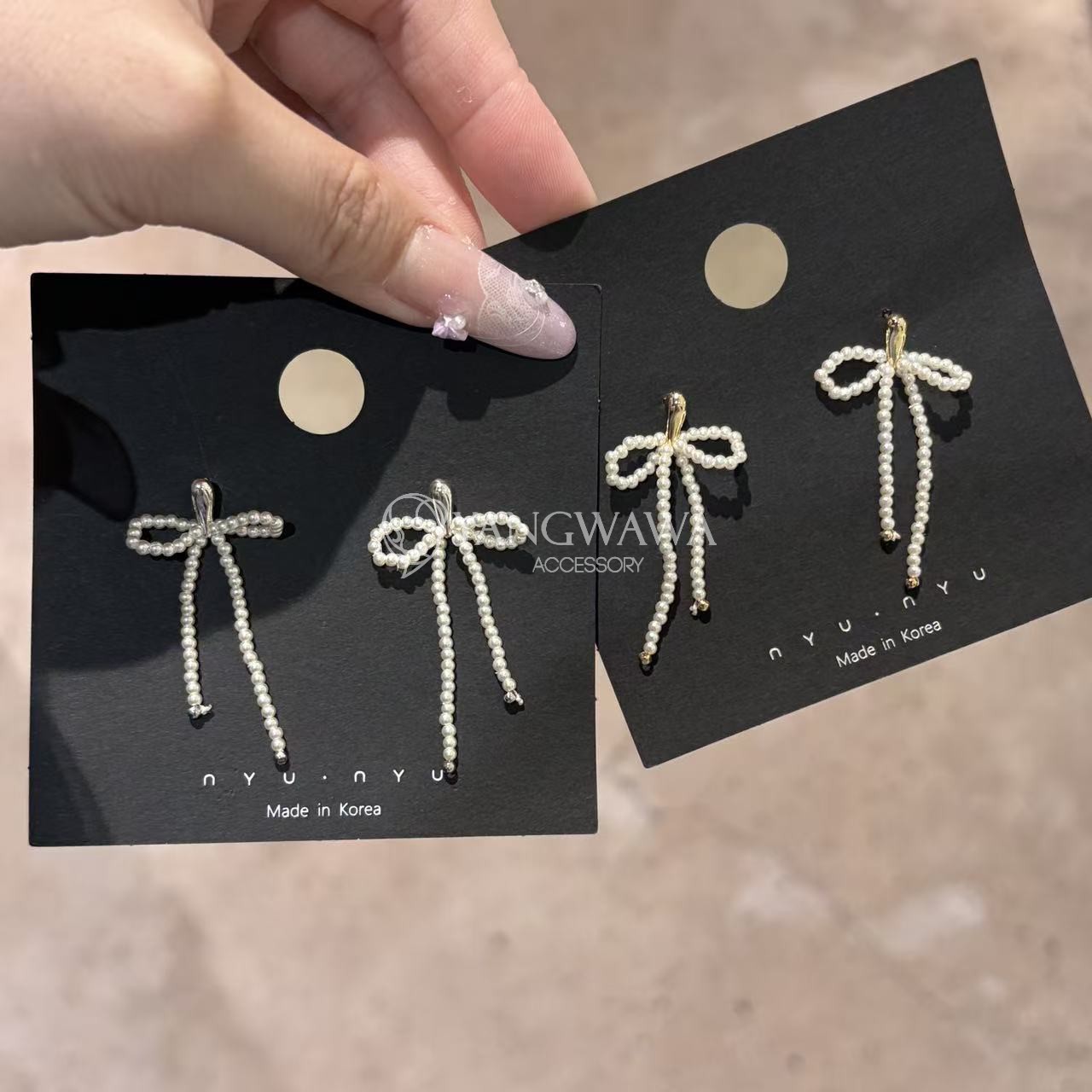 491401韩国东大门nyunyu珠珠蝴蝶结流苏款小众设计耳环