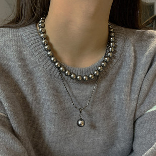 施家黑色珍珠单颗吊坠项链配饰女款轻奢高级感叠戴毛衣锁骨毛衣链