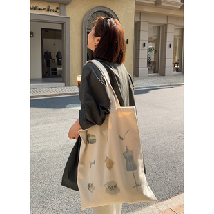 木子理想生活手艺人大容量帆布包印花竖向大包包