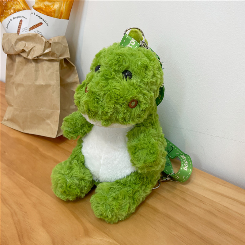 秋冬季小众斜挎包包女2026新款可爱绿色玩偶卡通毛毛恐龙包双肩包