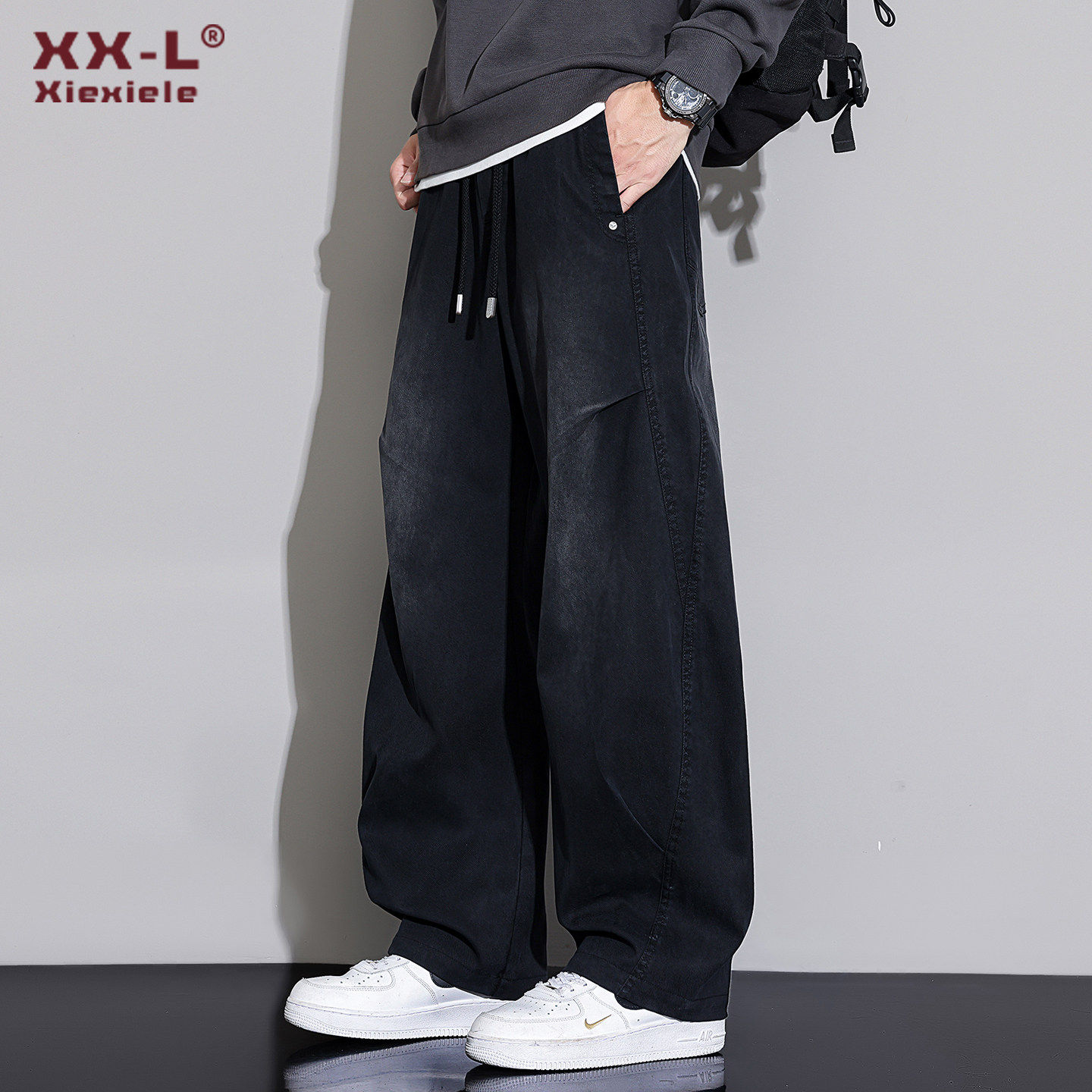 黑色弯刀牛仔裤男2026春季新款直筒宽松美式高街潮牌水洗休闲长裤