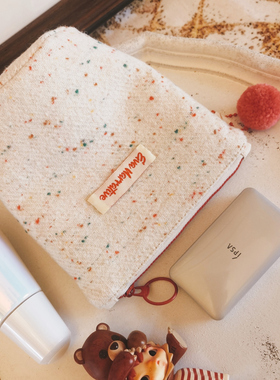 EVA花卷小圆桶羊毛文艺韩系清新盐系奶白耐装收纳随身化妆包中包