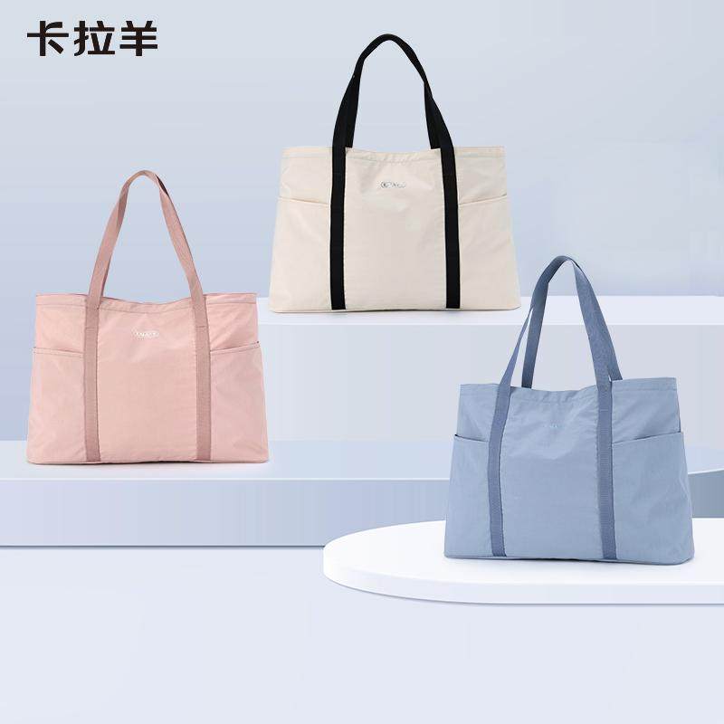 卡拉羊旅行包大容量防水收纳包可插拉杆打包袋男健身运动托特包女