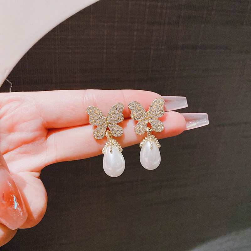 新品蝴蝶珍珠耳环气质百搭微镶锆石时尚简约夸张韩版超仙银针耳坠