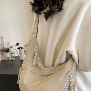 法国CavienKIon饺子包女单肩包韩版通勤旅游上课背包托特包斜挎包