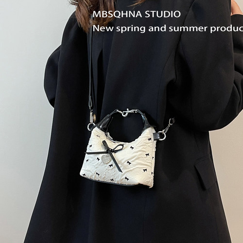 MBSQHNA小众时尚手拎包包女2025新款洋气蝴蝶结迷你斜挎饺子包潮