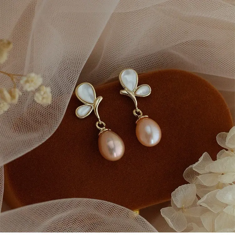 蝴蝶珍珠耳环2025新款爆款高级轻奢气质小众独特耳钉纯银耳饰
