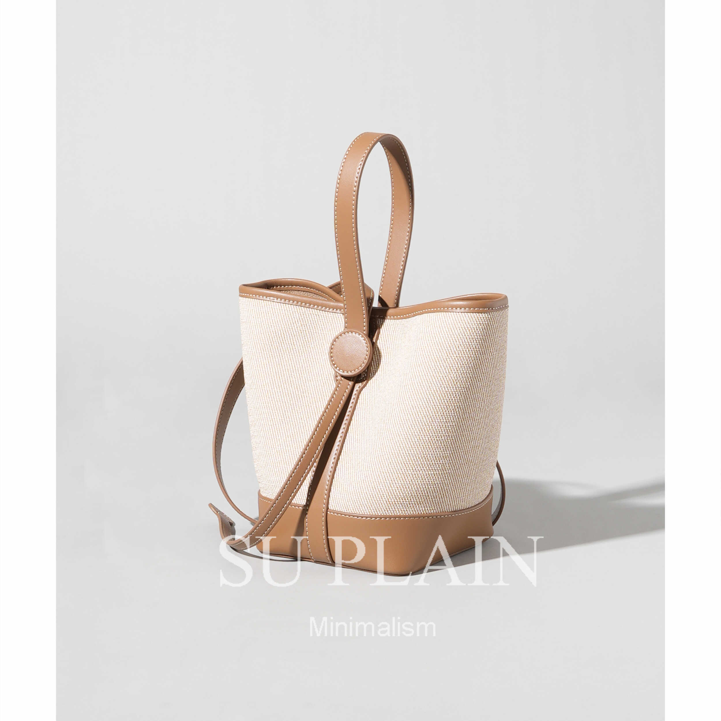 单肩斜挎真皮水桶包小众设计