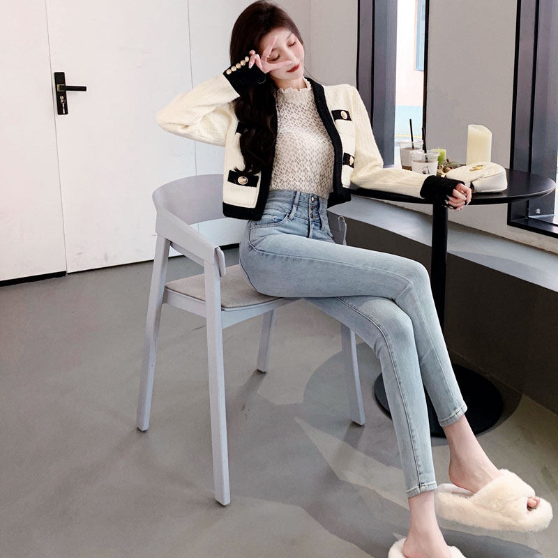 辰纯高腰牛仔裤女九分紧身浅蓝小脚裤春秋新款显瘦洗水铅笔长裤