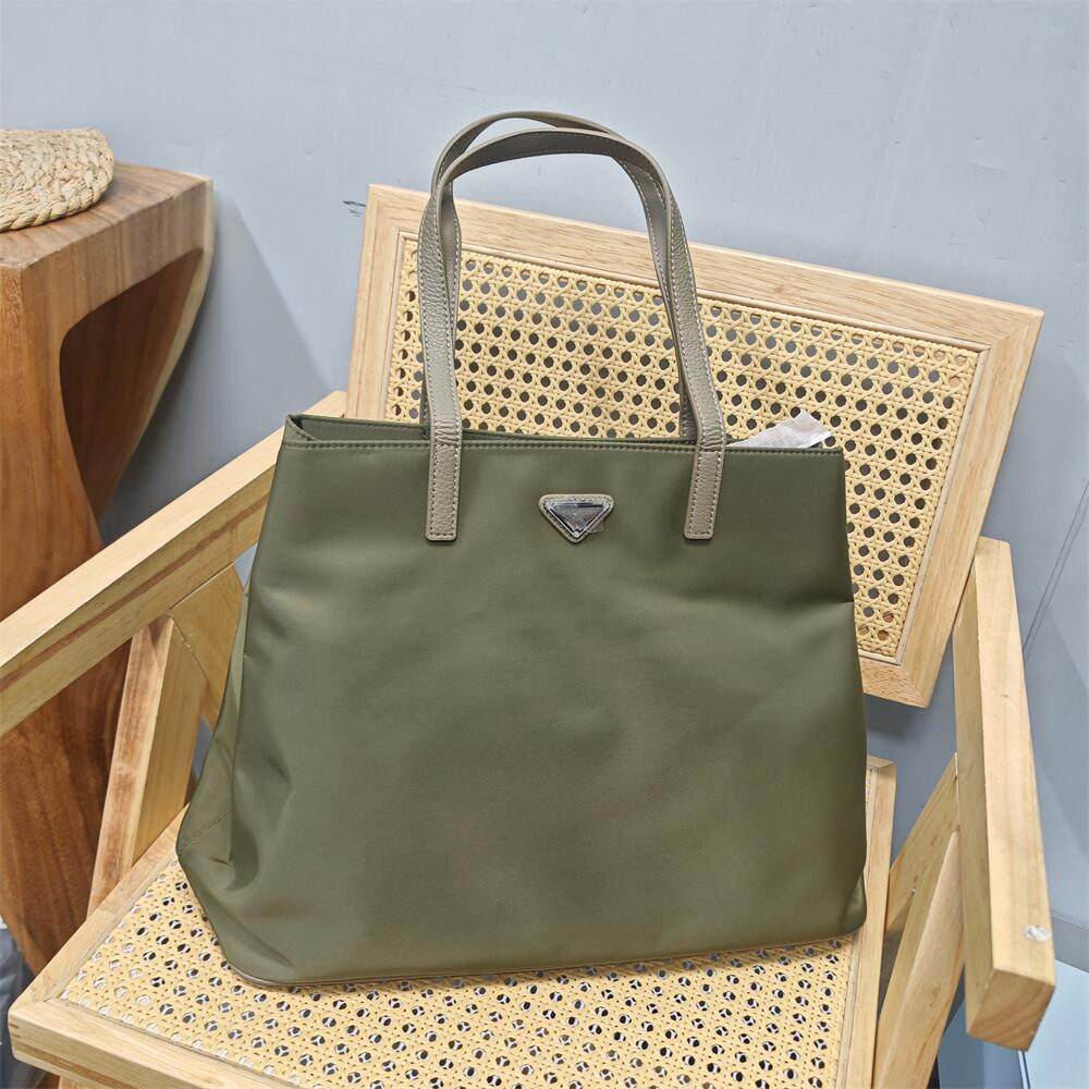 外贸出口尾货清仓大甩卖帆布配头层牛皮真皮手提单肩防水女士大包