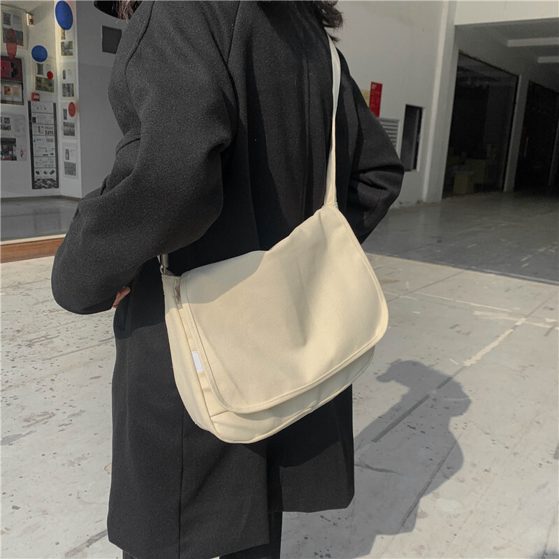 学生上课包女斜挎邮差包帆布单肩包男工装包大容量挎包黑色布包潮图片