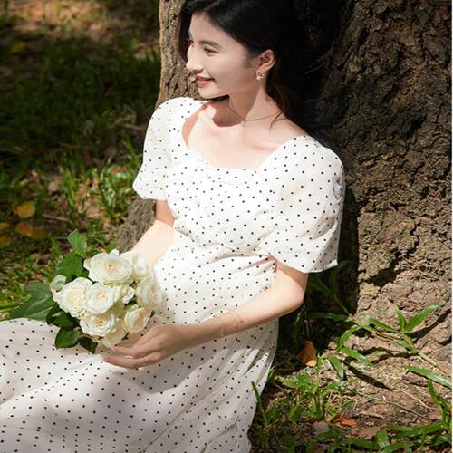 小个子杏色不规则裙摆波点连衣裙