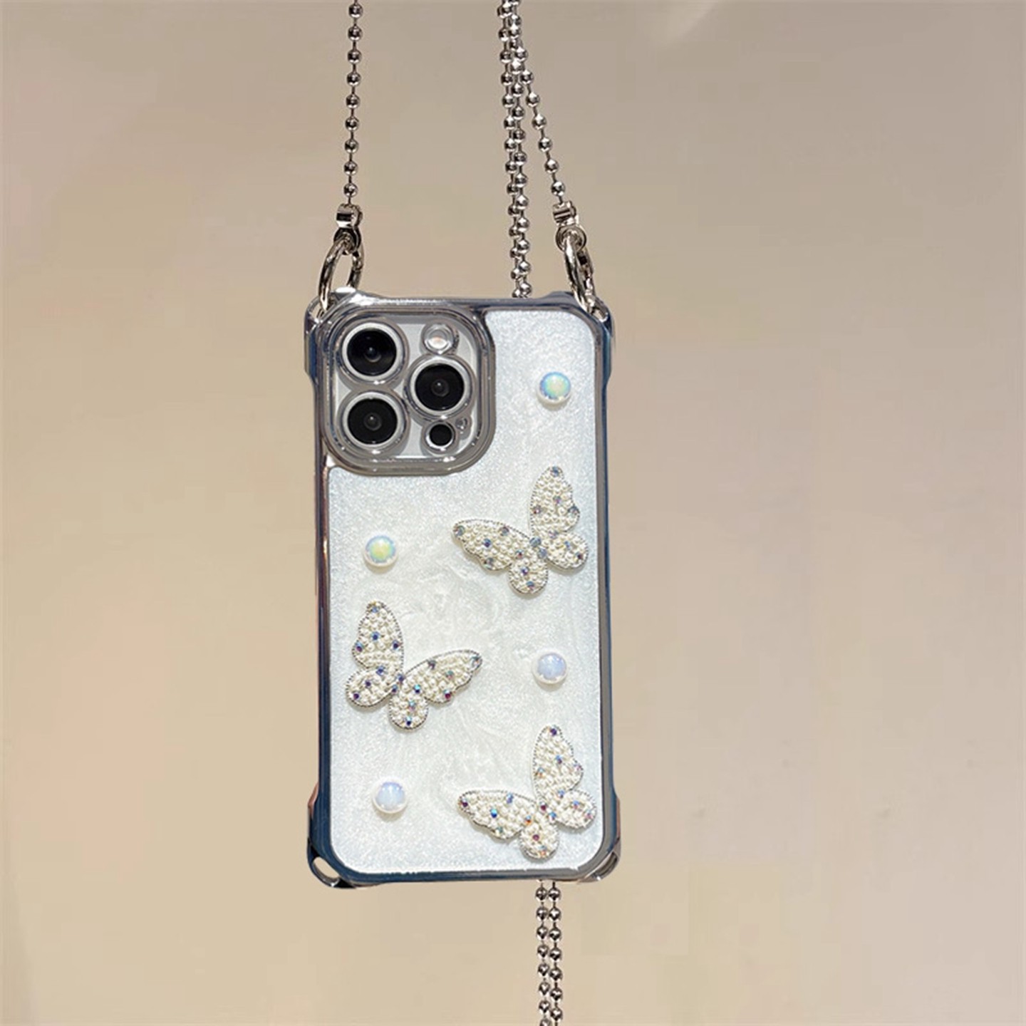 立体镭射珍珠水钻蝴蝶适用于iphone15手机壳苹果16promax四角防摔可挂绳14plus电镀银色13斜跨链条12保护套11