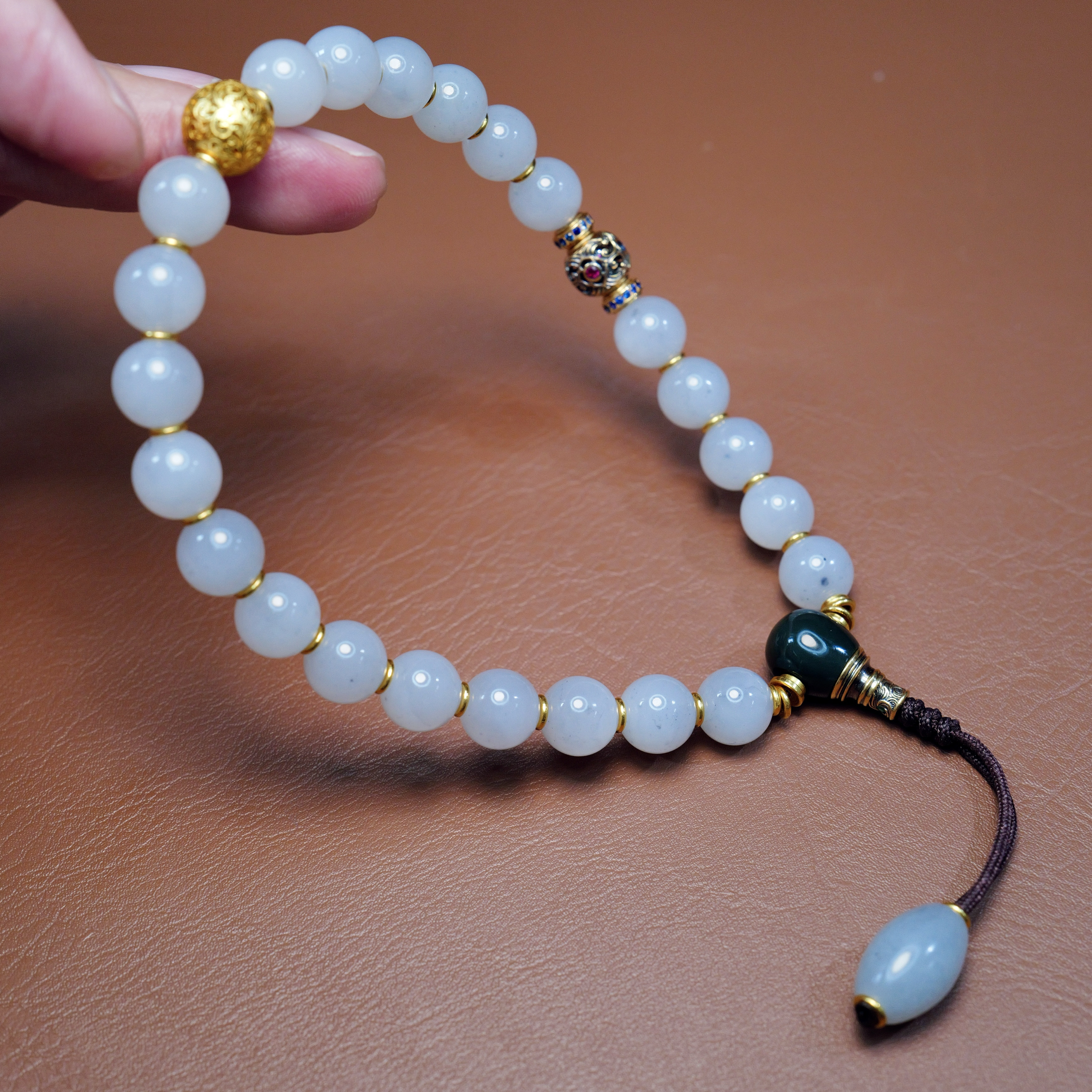 秋会长的和田玉点墨手持念珠文玩