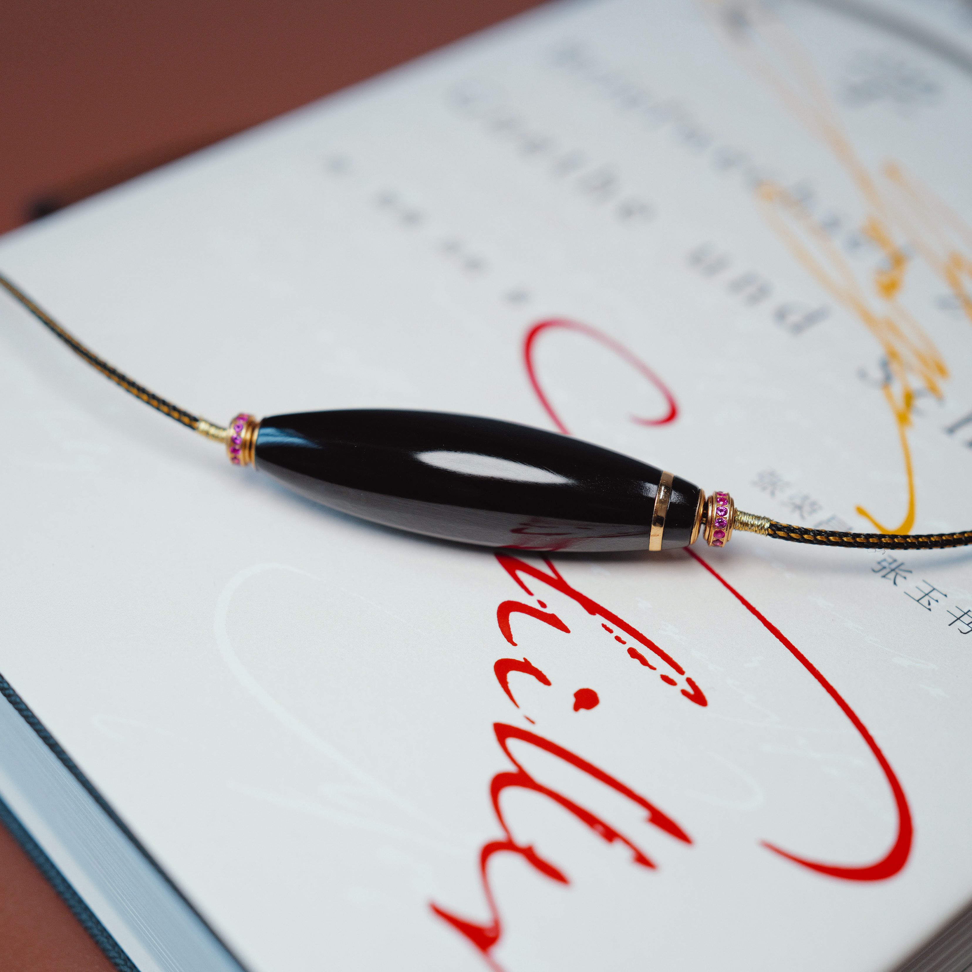 秋会长的和田玉黑青子料勒子原创