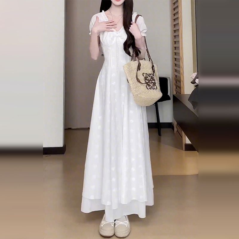 白色泡泡袖蕾丝连衣裙子女夏季2025新款独特漂亮绝美掐腰高级长裙