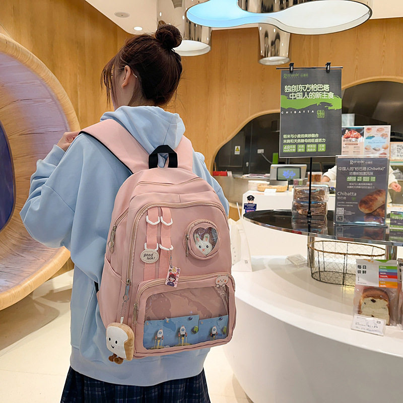 大容量百搭初中高中学生双肩背包粉色透明吧唧痛包娃包可爱书包女