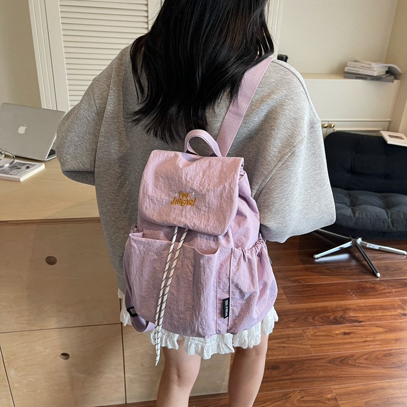 休闲大容量双肩背包女式2025新款韩系轻便睿营旅行包纯色学生