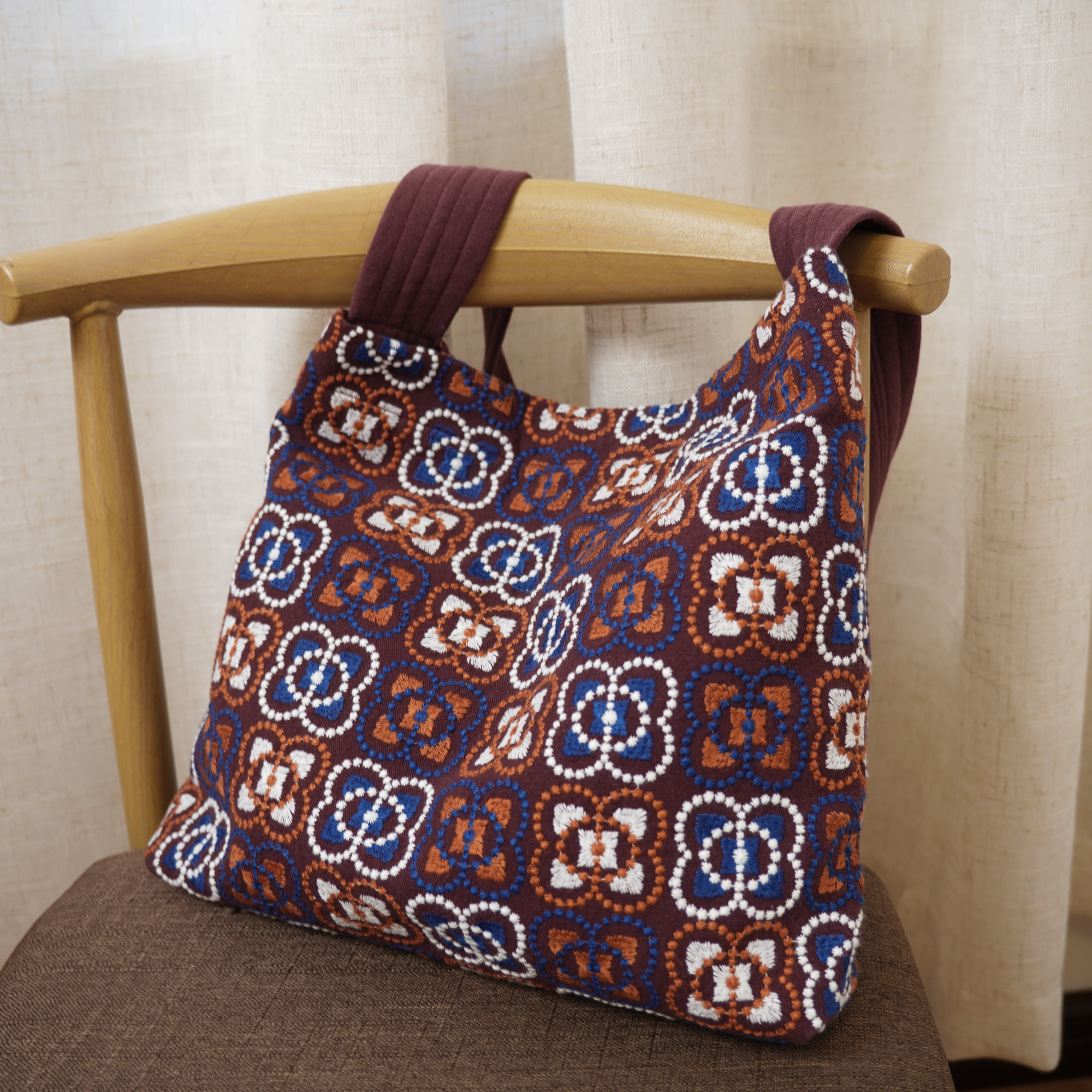 原创刺绣布艺单肩包大容量