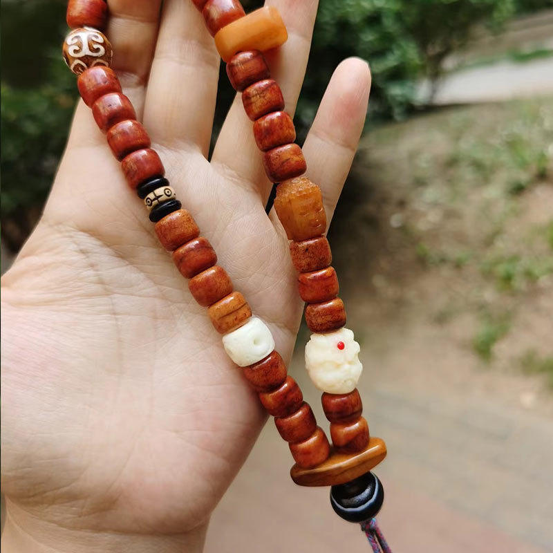 牦牛骨回流炸裂纹手持10mm桶珠猫头鹰吊坠白料配饰民族风手串批发